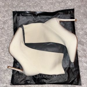 heel boots. never worn.